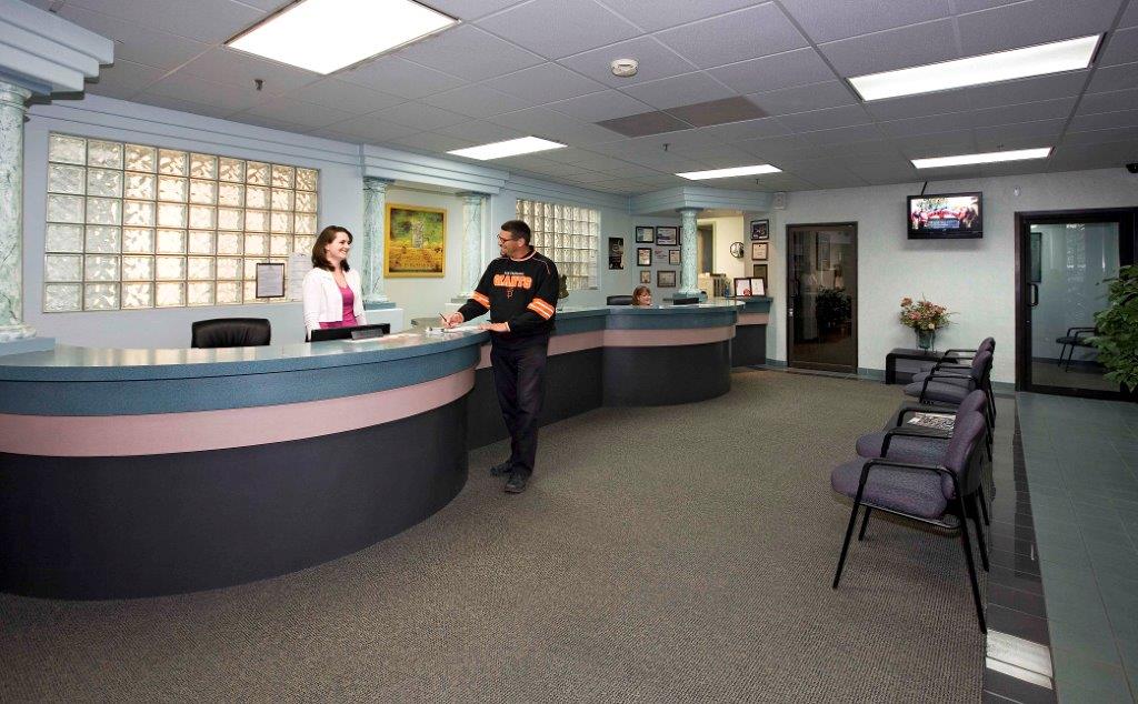 Clean auto body shop reception and repair office